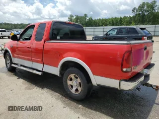 1999 Ford F-150 XL with VIN 2FTRX17L1XCB22247, listed as a Copart auction lot 60851965 with Not provided miles and Salvage title. Bid and sale history available at DreamBid. Image 2.