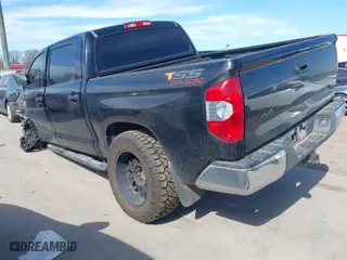 2018 Toyota Tundra 4WD SR5 with VIN 5TFDW5F12JX694518, listed as a IAAI auction lot 41663831 with 183,220 mi miles. Bid and sale history available at carsss.com. Image 3.