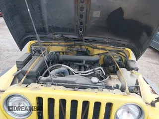 2000 Jeep Wrangler Sport with VIN 1J4FA49S3YP781614, listed as a IAAI auction lot 42292668 with 152,600 mi miles and . Bid and sale history available at DreamBid. Image 10.
