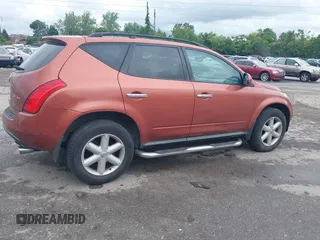 2005 Nissan Murano SL z VIN JN8AZ08W65W428697, wystawiony jako IAAI lot #42291815 z przebiegiem 89 742 mil mil oraz . Historia ofert i sprzedaży dostępna na DreamBid. Obrazek 4.