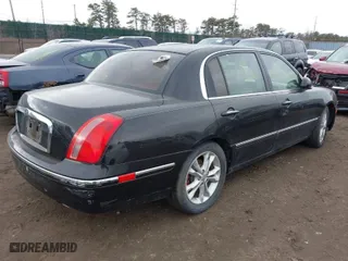 2007 Kia Amanti with VIN KNALD125575127059, listed as a IAAI auction lot 41735009 with 999,999 mi miles. Bid and sale history available at carsss.com. Image 4.