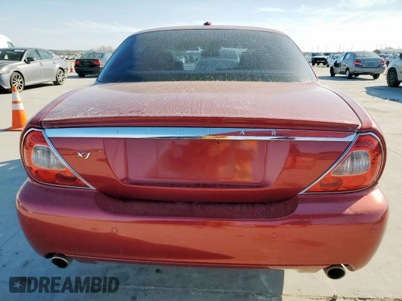 2008 Jaguar XJ with VIN SAJWA79B58SH20211, listed as a Copart auction lot 46951055 with 144,655 mi miles and Salvage Title. Bid and sale history available at carsss.com. Image 6.