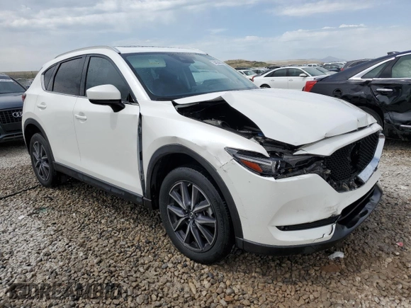 2018 Mazda CX-5 Grand Touring with VIN JM3KFBDM9J0468463, listed as a Copart auction lot 54524805 with 73,389 mi miles and Salvage Title. Bid and sale history available at DreamBid. Image 4.