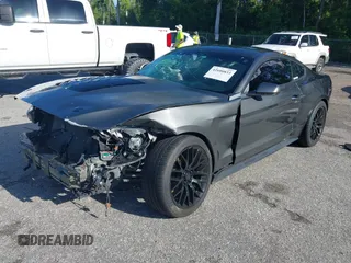 2017 Ford Mustang EcoBoost z VIN 1FA6P8TH5H5287023, wystawiony jako IAAI lot #42600833 z przebiegiem 103 685 mil mil oraz . Historia ofert i sprzedaży dostępna na DreamBid. Obrazek 18.