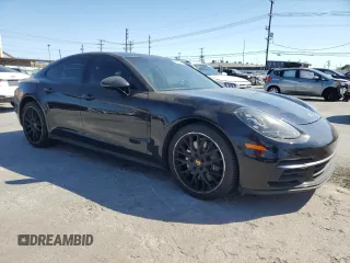 2020 Porsche Panamera с VIN WP0AA2A74LL100419, выставлен на аукционе Copart как лот 58515175 с пробегом 54 308 миль миль и Списание • Salvage title. История ставок и продаж доступна на DreamBid. Изображение 4.