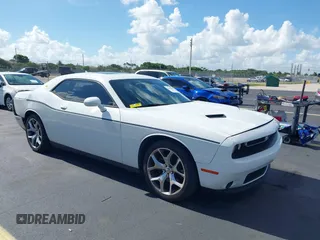 2015 Dodge Challenger SXT Plus with VIN 2C3CDZBG4FH723004, listed as a IAAI auction lot 42528880 with 129,535 mi miles and . Bid and sale history available at DreamBid. Image 1.