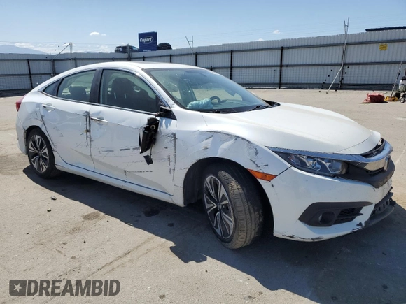 2018 Honda Civic EX-L z VIN JHMFC1F77JX016165, wystawiony jako Copart lot #56885445 z przebiegiem Nie podano mil oraz Szkoda całkowita • Salvage title. Historia ofert i sprzedaży dostępna na DreamBid. Obrazek 4.