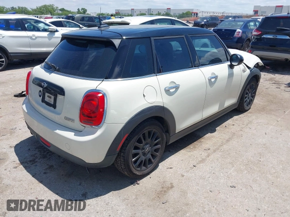 2016 MINI Hardtop 4 Door z VIN WMWXU1C50G2D08848, wystawiony jako IAAI lot #42215256 z przebiegiem 102 643 mil mil oraz . Historia ofert i sprzedaży dostępna na DreamBid. Obrazek 4.