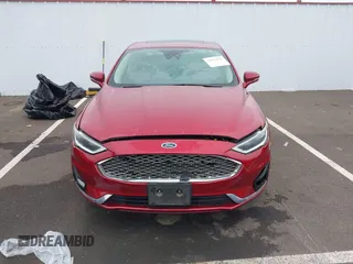 2019 Ford Fusion Titanium with VIN 3FA6P0K98KR179513, listed as a IAAI auction lot 41820059 with 112,155 mi miles. Bid and sale history available at carsss.com. Image 12.