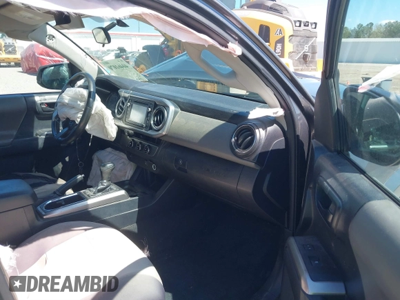 2016 Toyota Tacoma SR with VIN 5TFRX5GN6GX070766, listed as a IAAI auction lot 40461070 with 144,039 mi miles and . Bid and sale history available at DreamBid. Image 5.