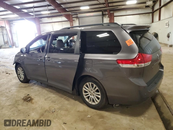 2014 Toyota Sienna XLE with VIN 5TDYK3DC0ES501557, listed as a Copart auction lot 56290015 with Not Provided miles and Clean Title. Bid and sale history available at DreamBid. Image 2.