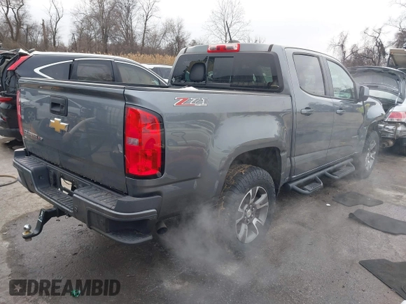 2020 Chevrolet Colorado 4WD Z71 with VIN 1GCGTDEN3L1154721, listed as a IAAI auction lot 41622361 with 64,628 mi miles and . Bid and sale history available at DreamBid. Image 4.