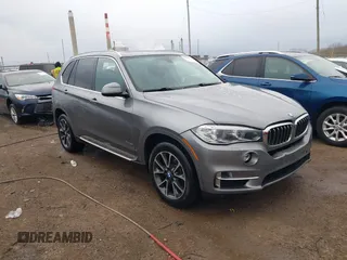 2017 BMW X5 xDrive35i with VIN 5UXKR0C38H0V83559, listed as a IAAI auction lot 41860595 with 92,037 mi miles. Bid and sale history available at carsss.com. Image 1.