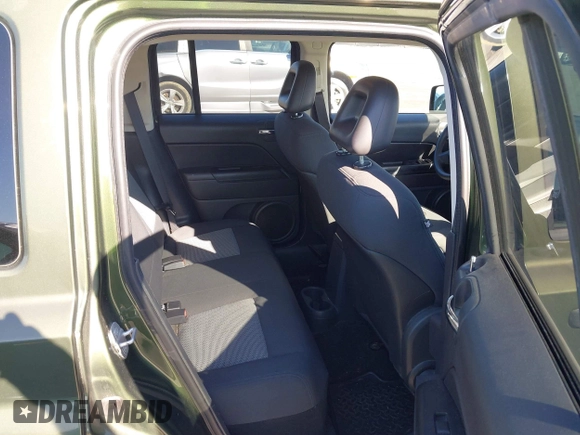 2009 Jeep Patriot Sport with VIN 1J4FT28B99D139661, listed as a IAAI auction lot 41644514 with 155,117 mi miles and . Bid and sale history available at DreamBid. Image 8.