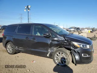 2021 Kia Sedona LX with VIN KNDMB5C1XM6671806, listed as a Copart auction lot 83027514 with 58,884 mi miles and Salvage Title. Bid and sale history available at carsss.com. Image 4.