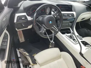 2016 BMW M6 z VIN WBS6E9C55GGF92676, wystawiony jako Copart lot #77663924 z przebiegiem 36 548 mil mil oraz Szkoda całkowita • Salvage title. Historia ofert i sprzedaży dostępna na DreamBid. Obrazek 8.