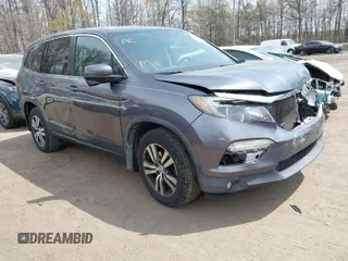 2016 Honda Pilot EX-L with VIN 5FNYF6H53GB004091, listed as a IAAI auction lot 42002063 with 173,009 mi miles. Bid and sale history available at carsss.com. Image 1.