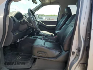 2010 Nissan Frontier Pro-4X with VIN 1N6AD0EV5AC435641, listed as a Copart auction lot 63388025 with 84,349 mi miles and Salvage title. Bid and sale history available at DreamBid. Image 7.