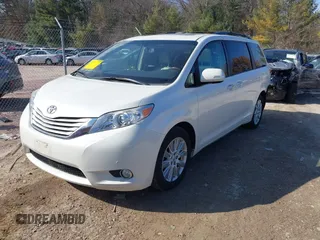 2014 Toyota Sienna Ltd with VIN 5TDDK3DC0ES090160, listed as a IAAI auction lot 41763998 with 160,508 mi miles. Bid and sale history available at carsss.com. Image 2.