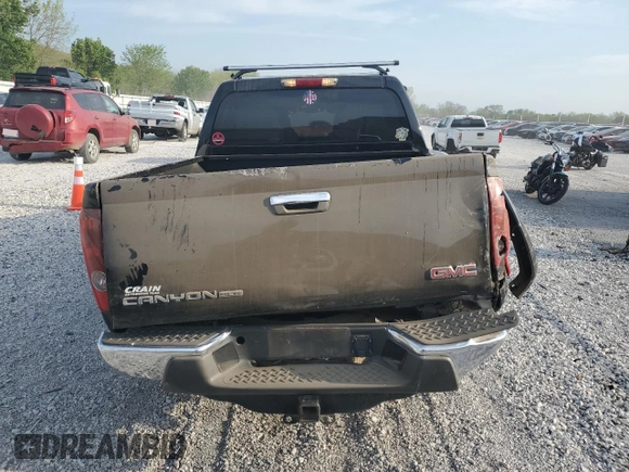 2011 GMC Canyon SLE1 z VIN 1GTH6MFE4B8108346, wystawiony jako Copart lot #53524715 z przebiegiem 169 080 mil mil oraz Szkoda całkowita • Salvage title. Historia ofert i sprzedaży dostępna na DreamBid. Obrazek 6.