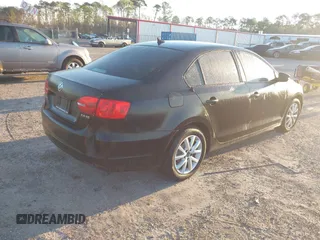2012 Volkswagen Jetta SE z VIN 3VWDX7AJ0CM340552, wystawiony jako IAAI lot #41780133 z przebiegiem 126 988 mil mil oraz . Historia ofert i sprzedaży dostępna na DreamBid. Obrazek 4.