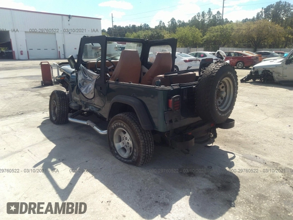 1995 Jeep Wrangler S with VIN 1J4FY19P4SP207049, listed as a IAAI auction lot 41315322 with 12,454 mi miles. Bid and sale history available at carsss.com. Image 3.