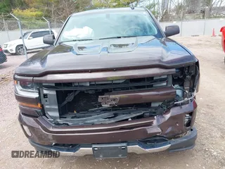 2016 Chevrolet Silverado 1500 LT with VIN 3GCUKREC3GG305792, listed as a IAAI auction lot 42083847 with 72,325 mi miles and . Bid and sale history available at DreamBid. Image 13.