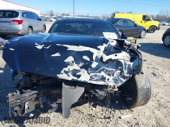 2016 Ford Mustang V6 z VIN 1FA6P8AM5G5226866, wystawiony jako IAAI lot #41306547 z przebiegiem Nie podano mil oraz . Historia ofert i sprzedaży dostępna na DreamBid. Obrazek 12.