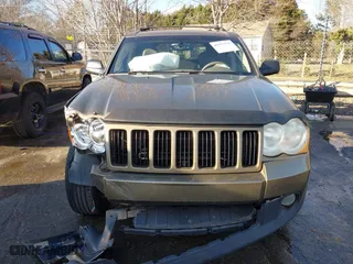 2009 Jeep Grand Cherokee Laredo with VIN 1J8GS48K79C516320, listed as a IAAI auction lot 41353131 with 166,739 mi miles. Bid and sale history available at carsss.com. Image 12.