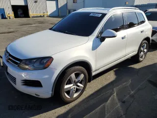 2012 Volkswagen Touareg Exec with VIN WVGEF9BP1CD010015, listed as a Copart auction lot 72646154 with 163,502 mi miles and Salvage Title. Bid and sale history available at DreamBid. Image 1.