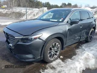 2016 Mazda CX-9 Grand Touring with VIN JM3TCBDY3G0109201, listed as a IAAI auction lot 41705355 with 92,657 mi miles and . Bid and sale history available at carsss.com. Image 2.