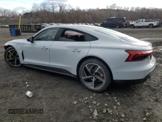 2024 Audi RS e-tron GT z VIN WAUBHBFW7R7901666, wystawiony jako Copart lot #86443564 z przebiegiem Nie podano mil oraz Szkody całkowita. Historia ofert i sprzedaży dostępna na DreamBid. Obrazek 2.