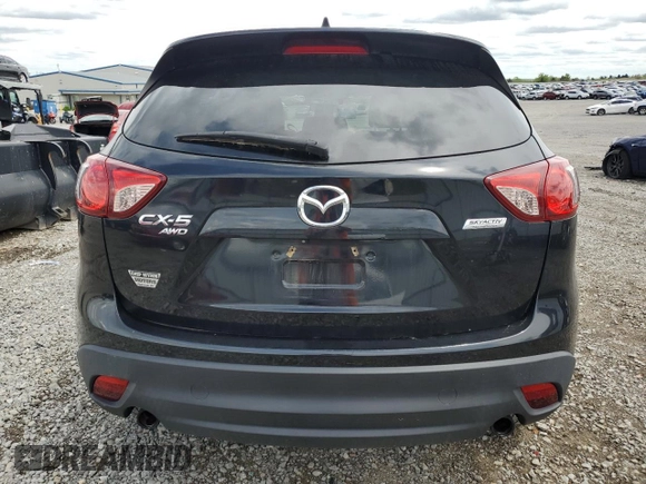 2014 Mazda CX-5 Grand Touring with VIN JM3KE4DY3E0304908, listed as a Copart auction lot 53873655 with 144,382 mi miles and Salvage Title. Bid and sale history available at DreamBid. Image 6.