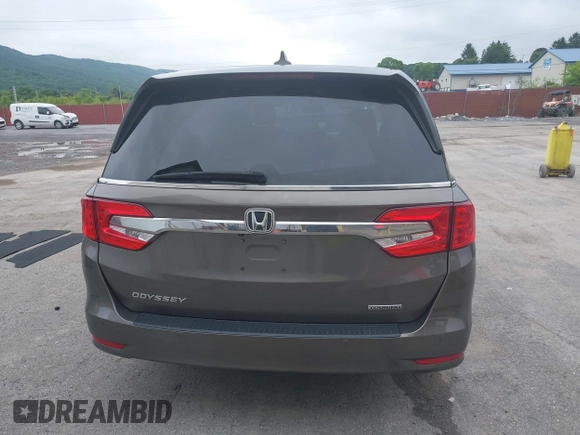 2018 Honda Odyssey Touring with VIN 5FNRL6H89JB057148, listed as a IAAI auction lot 42511909 with 166,438 mi miles and . Bid and sale history available at DreamBid. Image 16.