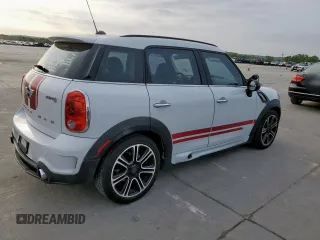 2014 MINI Countryman S with VIN WMWZC3C53EWT01161, listed as a Copart auction lot 50586965 with 151,813 mi miles and Salvage Title. Bid and sale history available at DreamBid. Image 3.