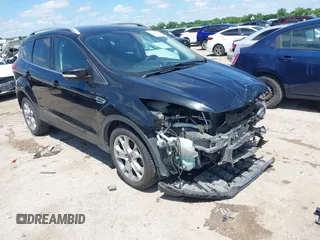 2015 Ford Escape Titanium with VIN 1FMCU0JX3FUB39808, listed as a IAAI auction lot 42212271 with 136,488 mi miles and . Bid and sale history available at DreamBid. Image 1.