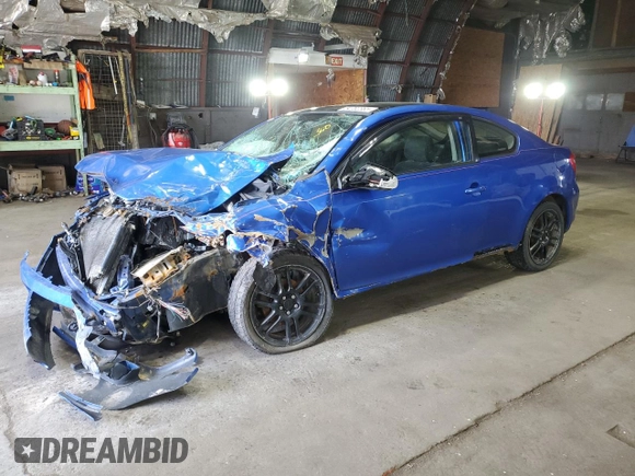 2006 Scion tC z VIN JTKDE167660131545, wystawiony jako Copart lot #54702365 z przebiegiem Nie podano mil oraz Szkoda całkowita • Salvage title. Historia ofert i sprzedaży dostępna na DreamBid. Obrazek 1.