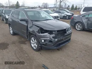 2021 Jeep Compass Latitude with VIN 3C4NJDBBXMT551702, listed as a IAAI auction lot 42045266 with 67,882 mi miles and . Bid and sale history available at DreamBid. Image 1.