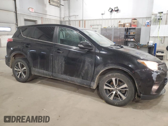 2018 Toyota RAV4 XLE with VIN 2T3RFREV7JW790330, listed as a Copart auction lot 49632845 with 88,084 mi miles and Salvage Title. Bid and sale history available at DreamBid. Image 4.