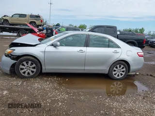 2007 Toyota Camry LE with VIN 4T1BK46K27U037911, listed as a IAAI auction lot 42158405 with 247,722 mi miles and . Bid and sale history available at DreamBid. Image 14.