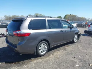 2015 Toyota Sienna XLE with VIN 5TDYK3DC4FS634937, listed as a IAAI auction lot 41869781 with 65,561 mi miles and . Bid and sale history available at carsss.com. Image 4.