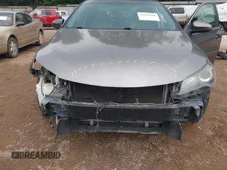 2015 Toyota Camry XLE with VIN 4T1BF1FKXFU891434, listed as a IAAI auction lot 42119108 with 142,736 mi miles and . Bid and sale history available at DreamBid. Image 6.