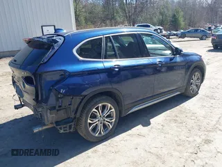 2017 BMW X1 xDrive28i with VIN WBXHT3C33H5F82035, listed as a IAAI auction lot 41944399 with 102,942 mi miles. Bid and sale history available at carsss.com. Image 4.