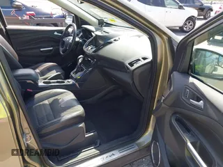 2013 Ford Escape Titanium with VIN 1FMCU0J94DUB06332, listed as a IAAI auction lot 41824742 with 92,633 mi miles. Bid and sale history available at carsss.com. Image 5.