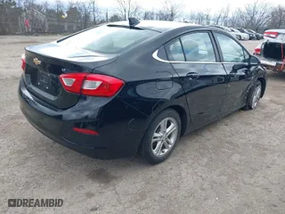 2018 Chevrolet Cruze LT with VIN 1G1BE5SM4J7113183, listed as a IAAI auction lot 41967136 with 134,542 mi miles. Bid and sale history available at carsss.com. Image 4.