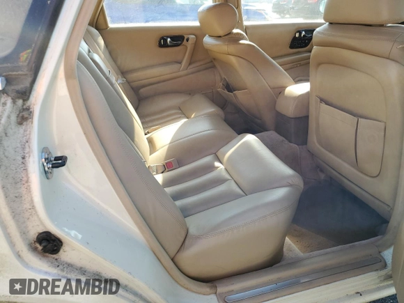 1994 Infiniti Q45 z VIN JNKNG01D3RM252218, wystawiony jako Copart lot #77230944 z przebiegiem 69 069 mil mil oraz Czysty tytuł • Clean title. Historia ofert i sprzedaży dostępna na DreamBid. Obrazek 10.
