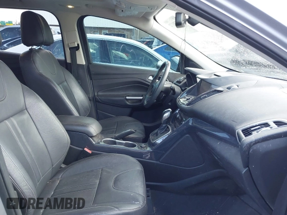 2013 Ford Escape Titanium with VIN 1FMCU0J90DUC13877, listed as a IAAI auction lot 42370172 with 119,745 mi miles and . Bid and sale history available at DreamBid. Image 5.