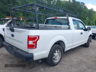 2018 Ford F-150 XL with VIN 1FTEX1CB5JFE55932, listed as a IAAI auction lot 42298917 with 143,923 mi miles and . Bid and sale history available at DreamBid. Image 4.