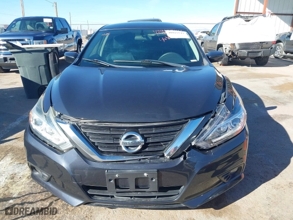 2017 Nissan Altima 2.5 SV with VIN 1N4AL3AP0HC277398, listed as a IAAI auction lot 40918944 with 214,412 mi miles. Bid and sale history available at carsss.com. Image 13.