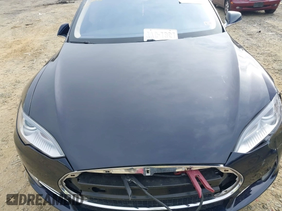 2014 Tesla Model S 60 with VIN 5YJSA1S12EFP42605, listed as a IAAI auction lot 40905031 with 68,155 mi miles and . Bid and sale history available at DreamBid. Image 10.